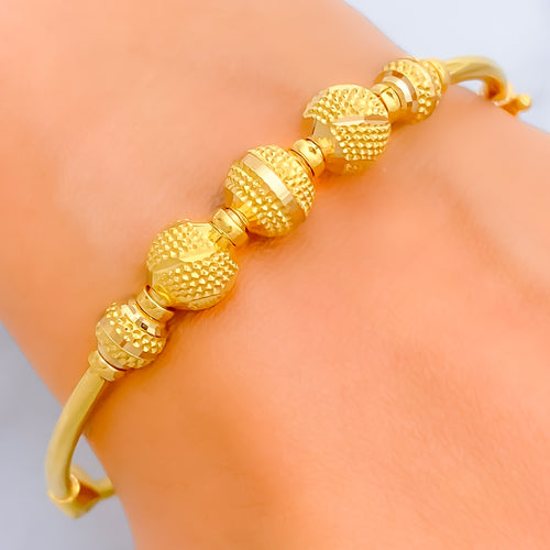 Iconic Striped 22k Gold Bangle Bracelet 