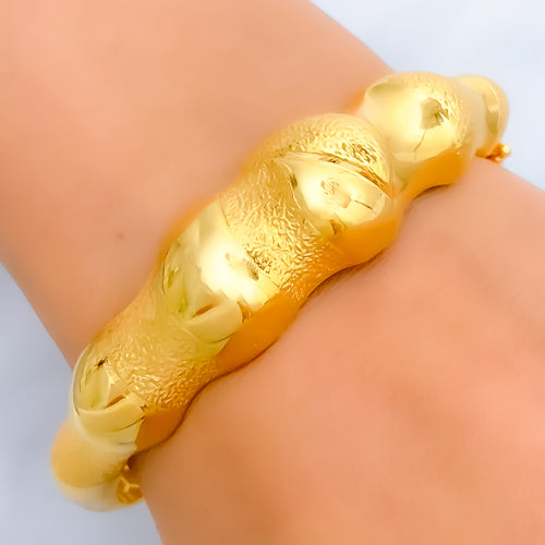 stunning-orb-21k-gold-bangle-bracelet