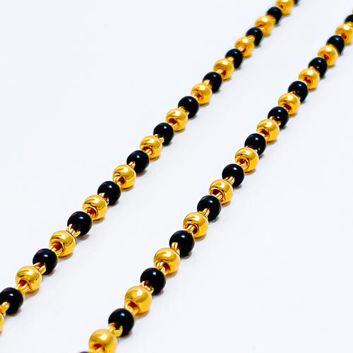 opulent-charming-22k-gold-black-bead-baby-bracelet