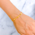Alternating Striped 21k Gold Bolo Bracelet