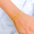 Shimmering Modern 21k Gold Bolo Bracelet