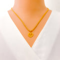 blooming-heart-o-22k-gold-letter-pendant