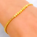 charm-twinkling-22k-gold-bracelet