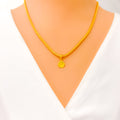 Reflective Slender 22k Gold Pendant