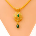 Mesmerizing Emerald Adorned 22k Gold Polki Pendant Set 