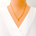 c-iconic-22k-gold-letter-pendant
