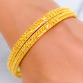 Brilliant Leaf Adorned 22k Gold Bangle Pair