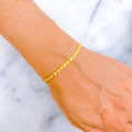 Dazzling Heart Accented 22K Gold Bracelet 