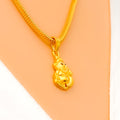 Radiant Reflective 22k Gold Ganesh Pendant