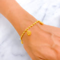 modish-fancy-22k-gold-charm-bracelet