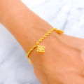 rich-geometric-22k-gold-charm-bracelet