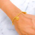 charming-apple-22k-gold-charm-bracelet