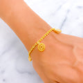 exquisite-adorned-22k-gold-charm-bracelet