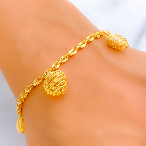 polished-ornamental-22k-gold-charm-bracelet