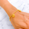 polished-ornamental-22k-gold-charm-bracelet