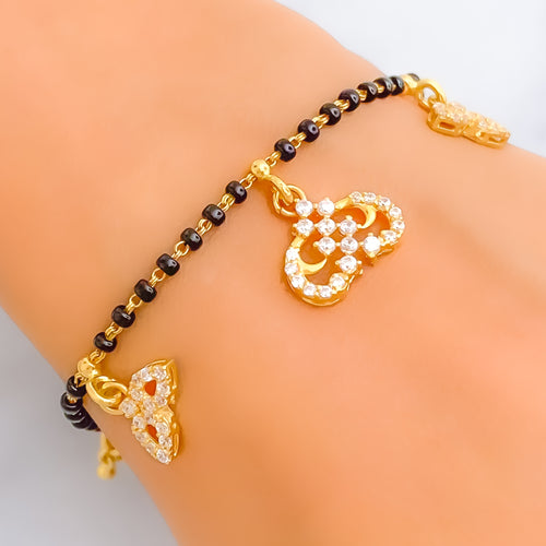 Magnificent Charmed 22k Gold Black Bead CZ Bracelet