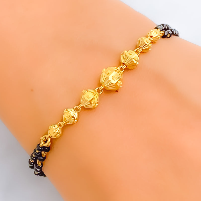 Reflective Striped 22k Gold Black Bead Bracelet