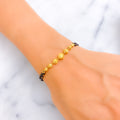 Reflective Striped 22k Gold Black Bead Bracelet