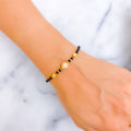 Fancy Decorative 22k Gold Black Bead CZ Bracelet