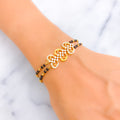 Extravagant Radiant 22k Gold Black Bead CZ Bracelet