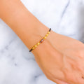 Vibrant Meenakari 22k Gold Black Bead Bracelet