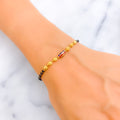 Vibrant Meenakari 22k Gold Black Bead Bracelet