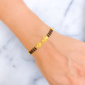 Traditional Motif 22k Gold Black Bead Bracelet