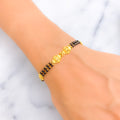 Traditional Motif 22k Gold Black Bead Bracelet