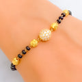 Delightful Evergreen 22k Gold Black Bead CZ Bracelet