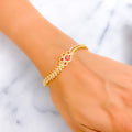 Glistening Floral 22k Gold CZ Bangle Bracelet