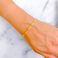 Glimmering Embossed 22k Gold Bangle Bracelet 