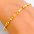 Glimmering Embossed 22k Gold Bangle Bracelet 