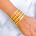 Brilliant Lustrous 22k Gold Dotted Bangles