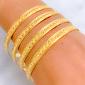 Brilliant Lustrous 22k Gold Dotted Bangles