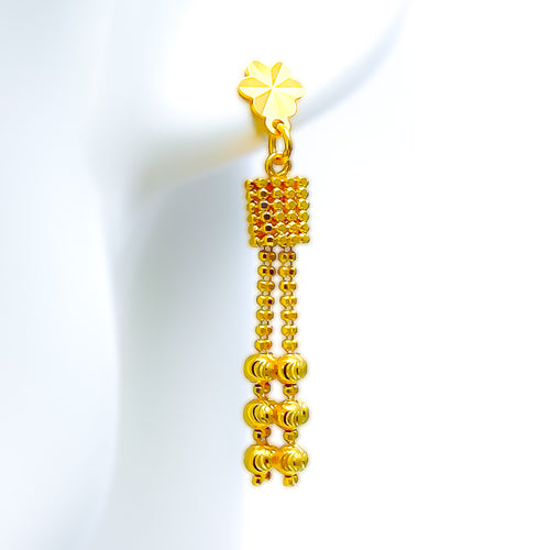 iconic-flowing-22k-gold-hanging-earrings