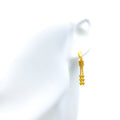 iconic-flowing-22k-gold-hanging-earrings