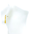 iconic-flowing-22k-gold-hanging-earrings