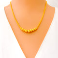 luminescent-wavy-22k-gold-necklace
