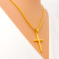 ornate-glowing-22k-gold-cross-pendant