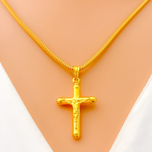 gleaming-22k-gold-cross-pendant