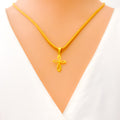 iridescent-22k-gold-cross-pendant