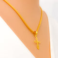 iridescent-22k-gold-cross-pendant