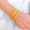 charm-alluring-22k-gold-pipe-bangles