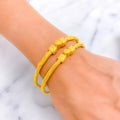 charm-alluring-22k-gold-pipe-bangles