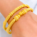 bold-decadent-22k-gold-pipe-bangles