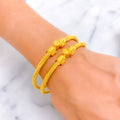 classic-adorned-22k-gold-pipe-bangles