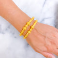 radiant-decorative-22k-gold-pipe-bangles