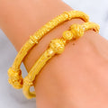 gleaming-artistic-22k-gold-pipe-bangles