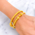 gleaming-artistic-22k-gold-pipe-bangles