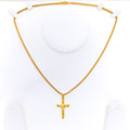 gleaming-22k-gold-cross-pendant
